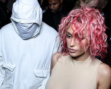 Bianca Censori in a nude coloured leotard, with Kanye West in an all-white outfit that covers his face at the Prototypes Menswear Spring/Summer 2025 show as part of Paris Fashion Week on June 19, 2024 in Paris, France.