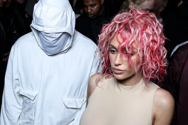 Bianca Censori in a nude coloured leotard, with Kanye West in an all-white outfit that covers his face at the Prototypes Menswear Spring/Summer 2025 show as part of Paris Fashion Week on June 19, 2024 in Paris, France.