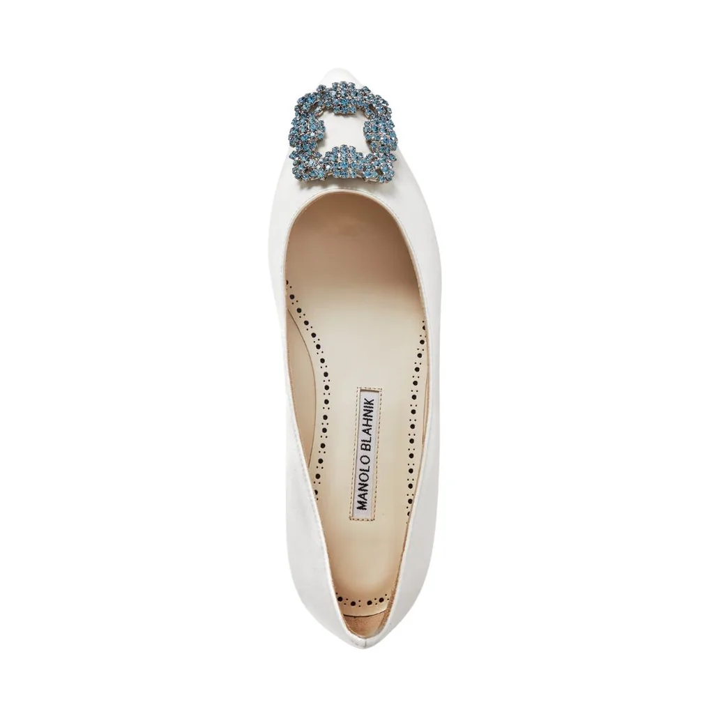 Manolo Blahnik white flats with blue jewel