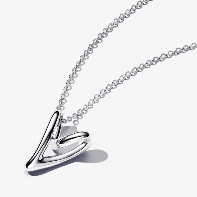 Silver heart-shaped pendant necklace with chain on white background.