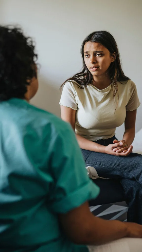 woman at doctor long consultation