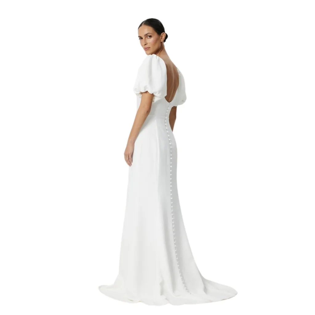 Chancery focuses on traditional silhouettes, such as puff sleeves, nipped bodies, and sweeping skirts, all at a super affordable price point. Most of their dresses are in the $400.00 range, making them a go-to for the budget-conscious bride.  