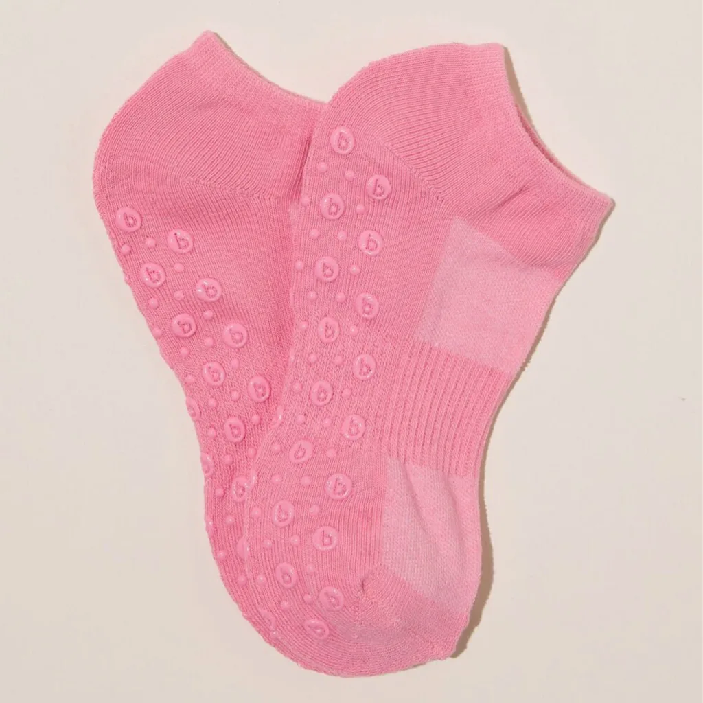 The affordable Performance Studio Sock from Cotton On comes in a range of shades including black, white, radiant rasberry (a bright true pink, pictured) and windsurfer, a pale blue. There is one to match any active wear set. They feature a low ankle, breathable anti-odour fabric and arch support.