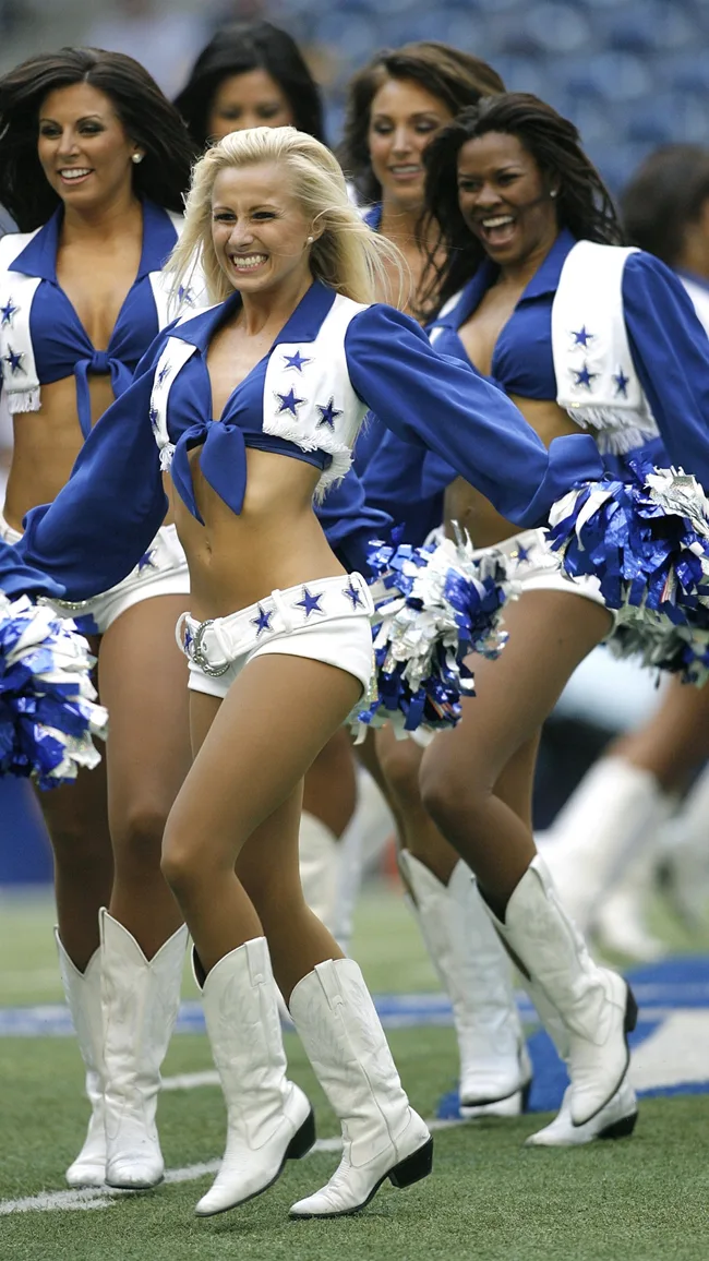 allas Cowboy Cheerleaders perform at a game against the Indianapolis Colts at Texas Stadium on August 9, 2007 in Irving, Texas. The Cowboys won 23-10.