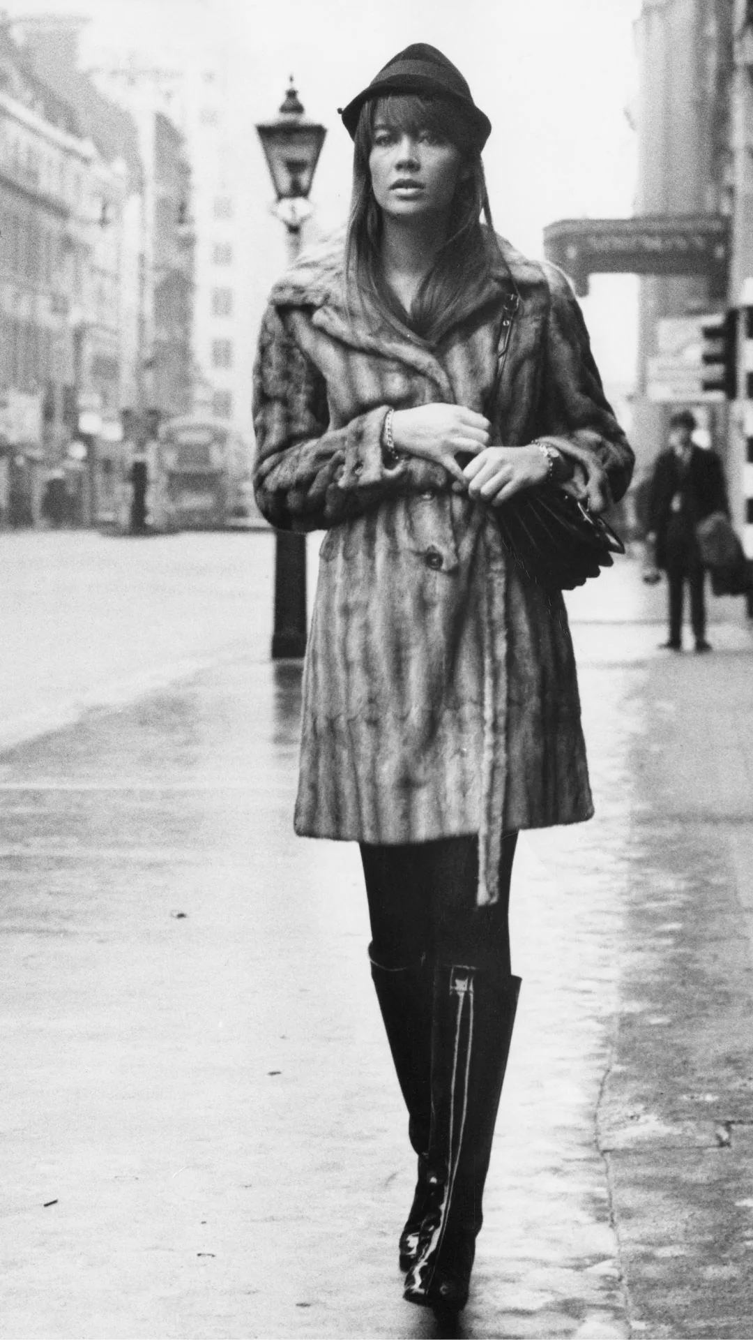 Françoise Hardy walks down The Strand in London.