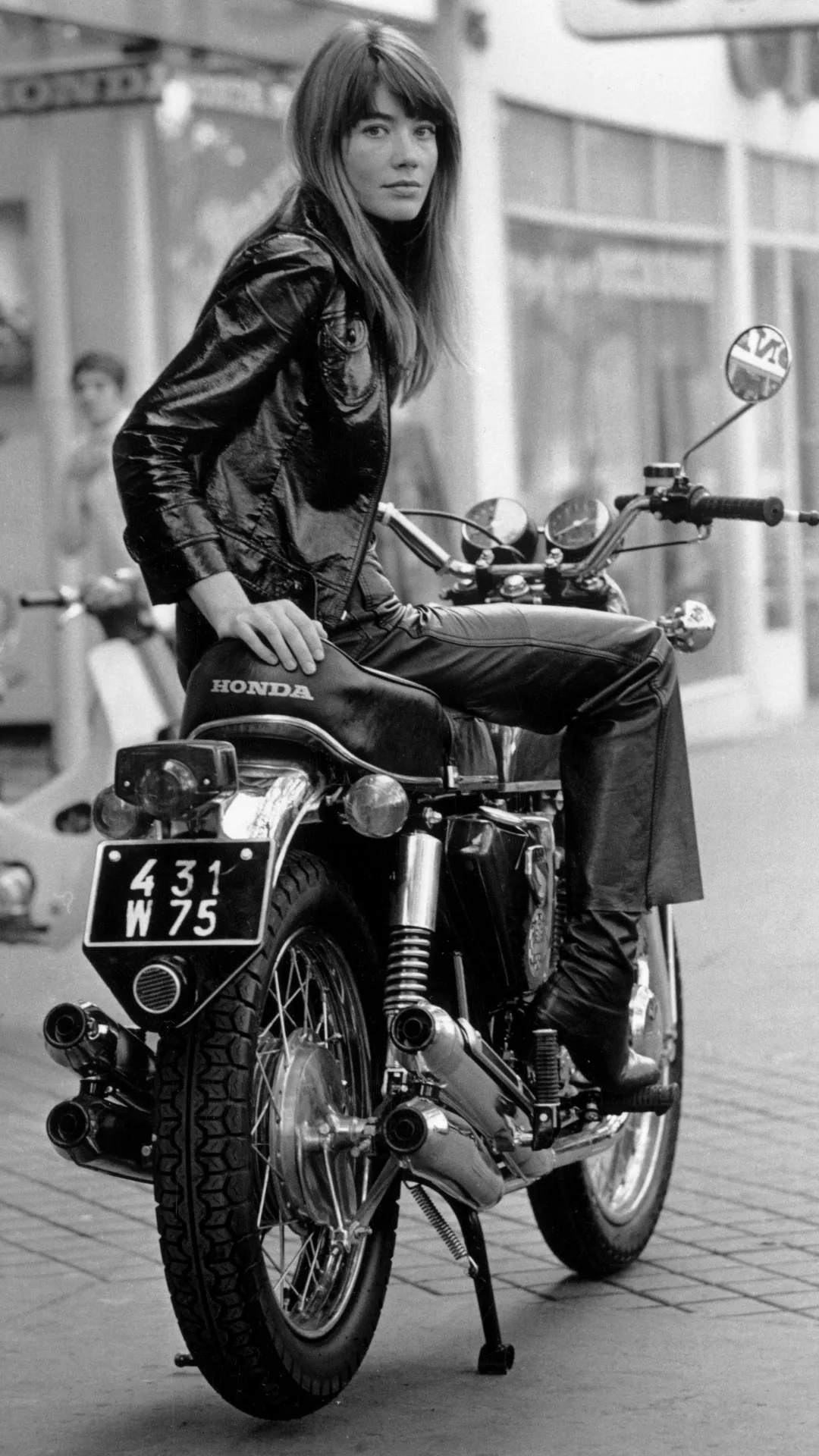  Francoise Hardy sitting on a Honda CB750 motorcycle, Paris, 25th October 1969