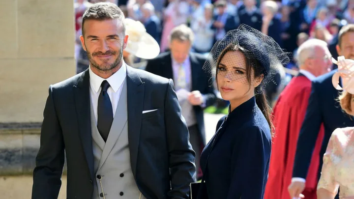 David and Victoria Beckham at Prince Harry and Meghan Markle's wedding in 2018 (Image: Getty)