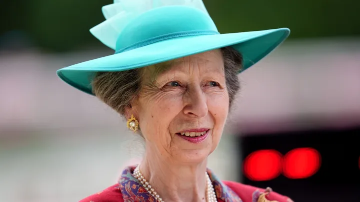 princess anne wears a teal hat