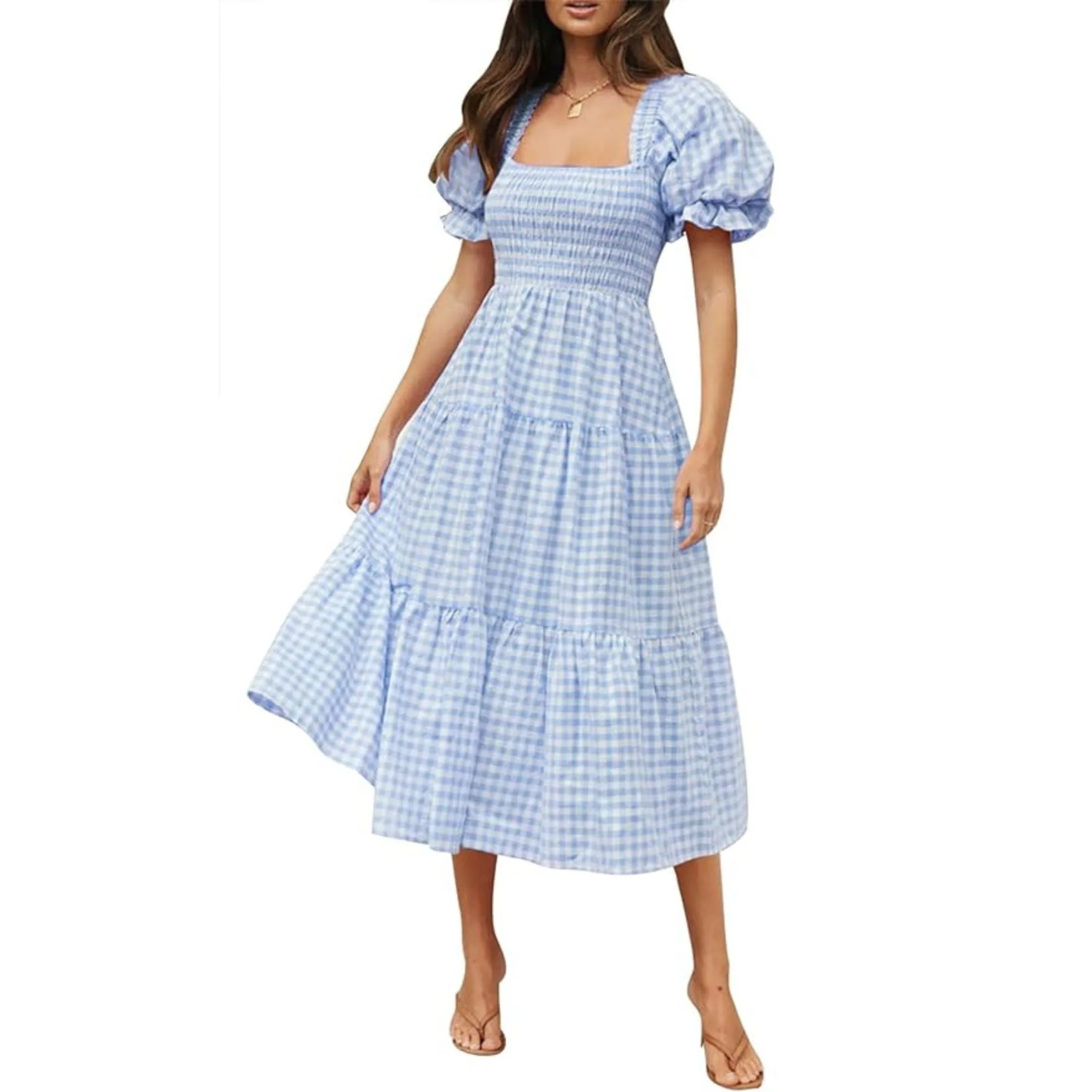 Seen on the runway at Louis Vuitton SS24 and Chloé AW24, it looks like the statement sleeve is going nowhere and the puff sleeves on this simple summer blue gingham dress are the perfect way to incorporate the trend. We also love the Bridgerton-approved squared-off neckline and structured bodice. Doll it up with heels or wear it with slides, we’re considering it a spring staple. The tiered skirt flares flatteringly from the waist and is worn here with kitten heel sandals. 