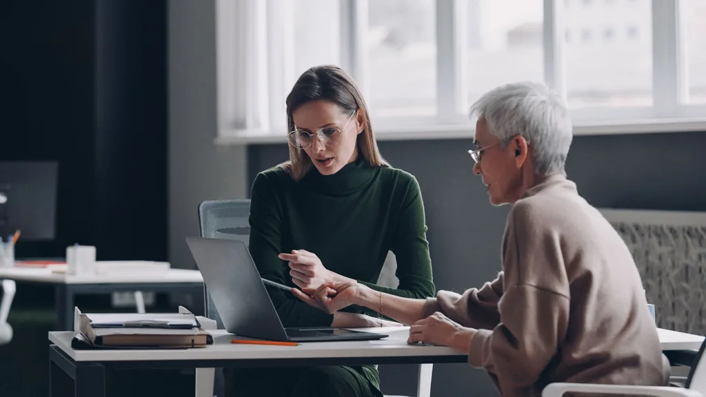 Woman with older colleague