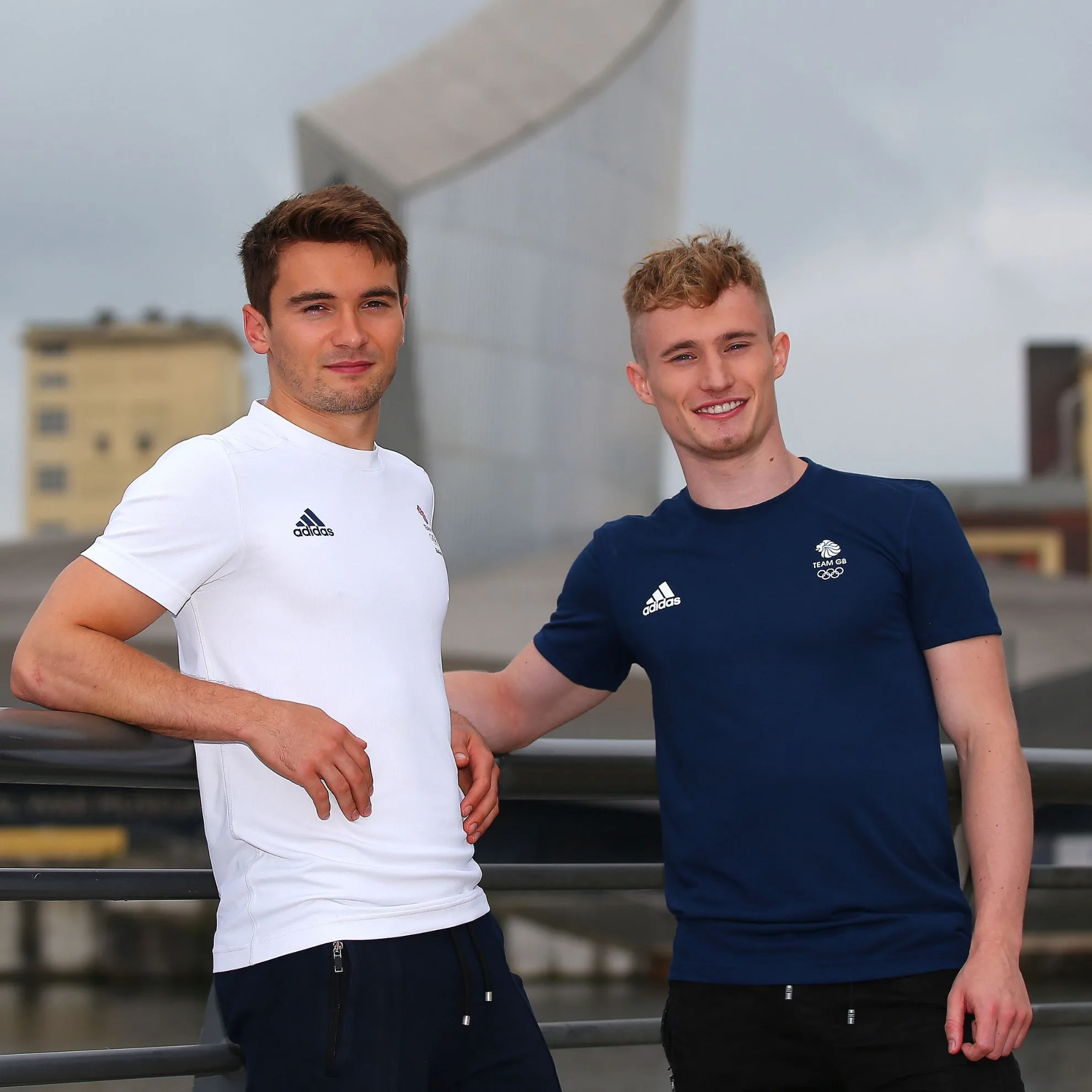 Dan Goodfellow (L) and Jack Laugher (R) (Diving) of Team GB pose for a photo during the Team GB British Olympic Association Tokyo 2020 One Year To Go Media Event at Media City on July 24, 2019 in Manchester, England.