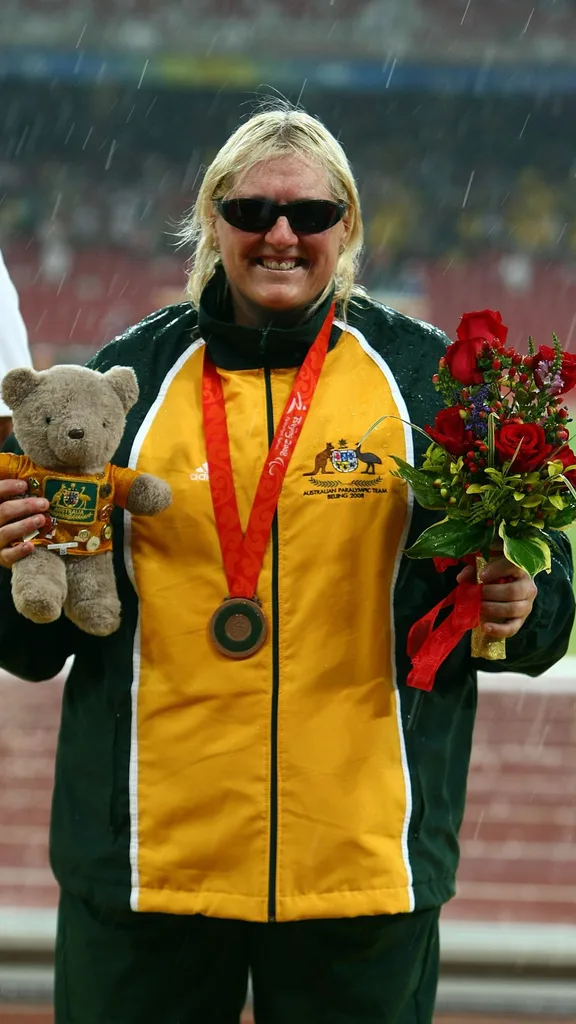  Bronze Medalist Jodi Willis-Roberts of Australia poses on the podium during the medal ceremony for the Women's Shot Put-F12/13 Athletics event at the National Stadium during day eight of the 2008 Paralympic Games on September 14, 2008 in Beijing, China.