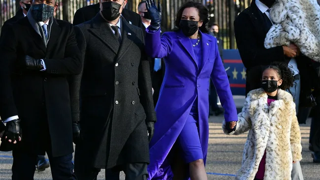 Vice President Kamala Harris and Second Gentleman Doug Emhoff along with family members walk along Pennsylvania Avenue to the White House in Washington, DC, after US President Joe Biden and Harris were sworn in, earlier on January 20, 2021.