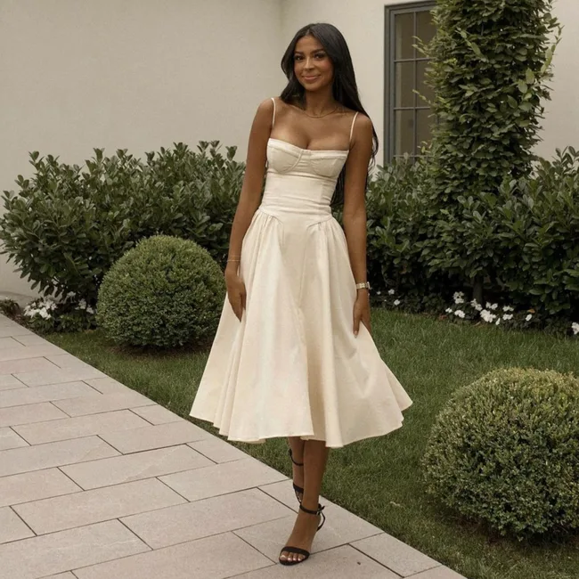 Layla Leanne Taylor poses in a stunning white dress.