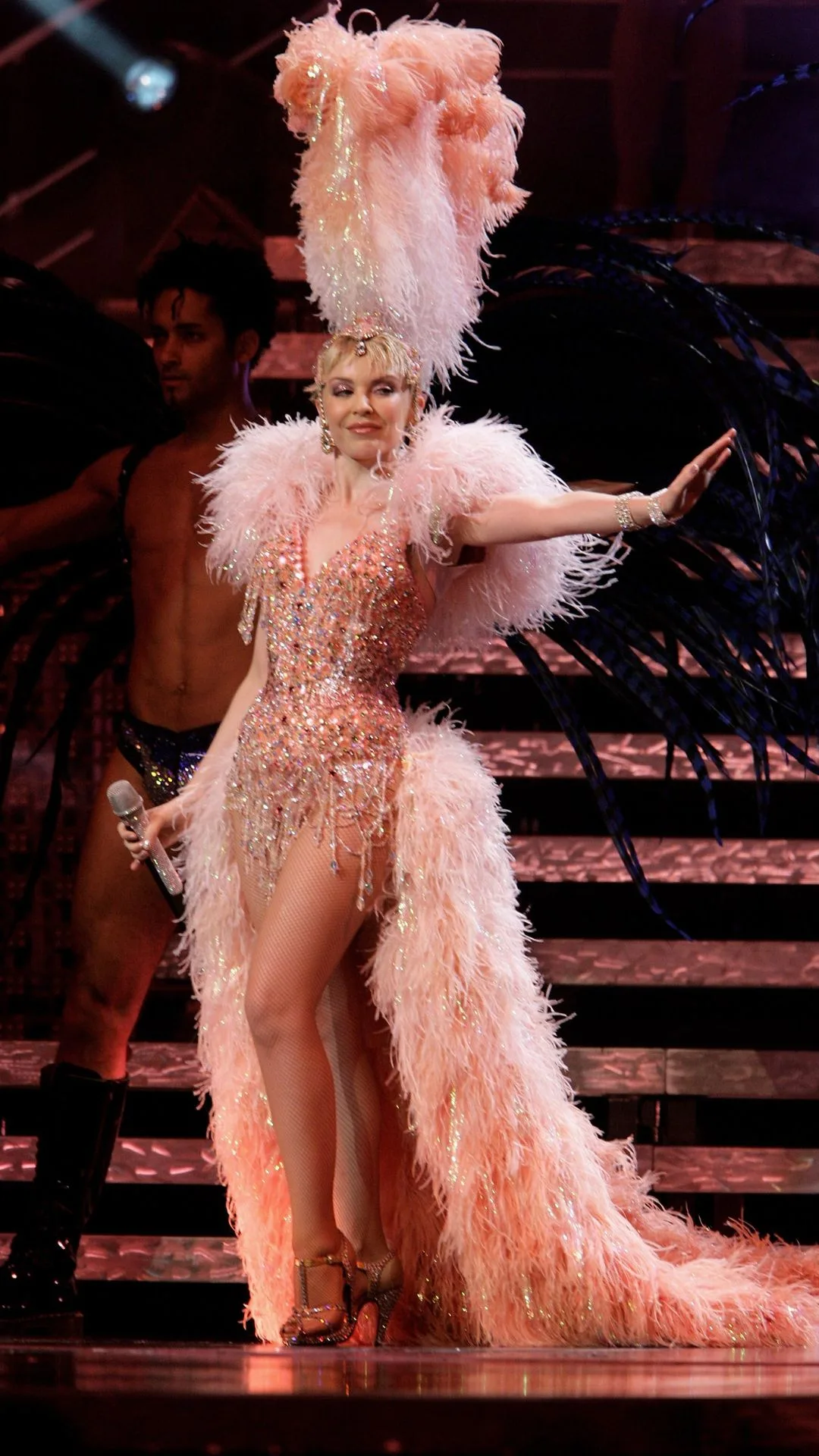 Kylie Minogue performs on stage for the opening night of her Showgirl Homecoming Tour at the Sydney Entertainment Centre on November 11, 2006.