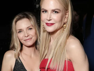 Michelle Pfeiffer and Nicole Kidman smiling to camera at the Golden Globes in 2020