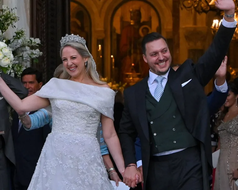 Princess Theodora daughter of former King of Greece Constantine II, and her husband Matthew Kumar leave the Athens' Orthodox Cathedral following their wedding ceremony at the Metropolis Greek Orthodox Cathedral