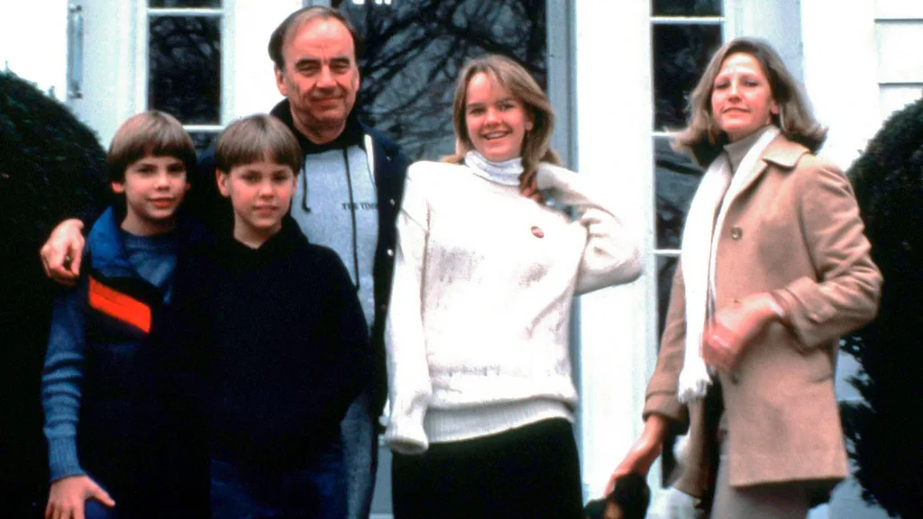 Rupert Murdoch poses with his wife Anna and their children Lachlan, James and Elisabeth outside their home