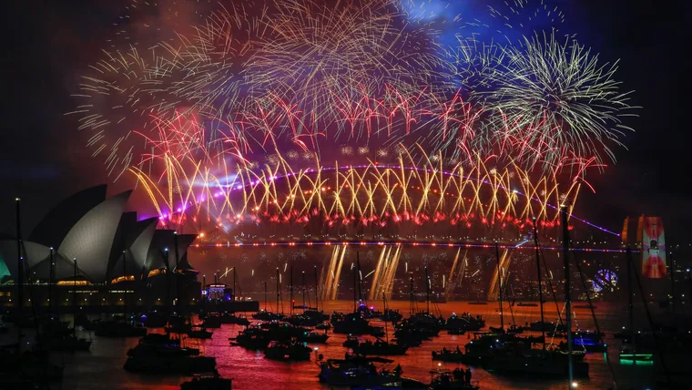 Fireworks light up the sky over the Sydney Harbour Bridge and the Sydney Opera House during New Year's Eve celebrations on January 01, 2024 in Sydney