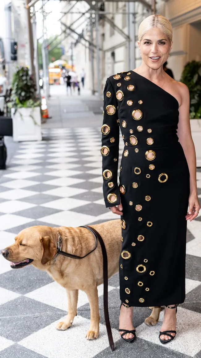 Actress Selma Blair and Blair's service dog Scout are seen leaving Christian Siriano Fashion Show during New York Fashion Week at The Pierre Hotel on September 06, 2024 in New York City.