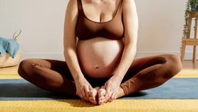 pregnant woman wearing a maternity activewear brand