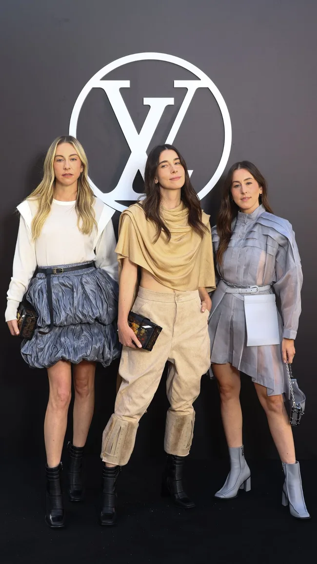 Este Haim, Danielle Haim and Alana Haim attend the Louis Vuitton Paris Womenswear Spring-Summer 2025 show