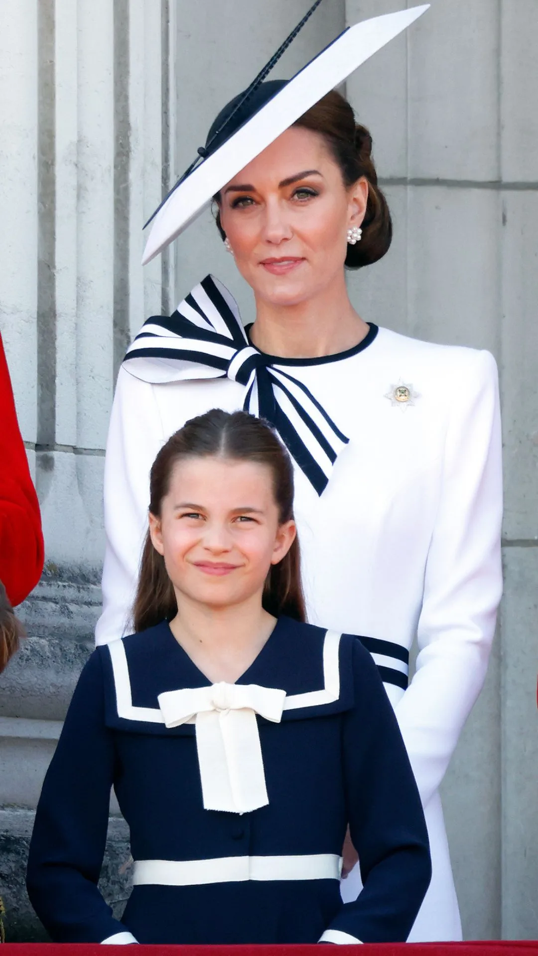 Catherine, Princess of Wales and Princess Charlotte of Wales watch an RAF flypast from the balcony of Buckingham Palace after attending Trooping the Colour on June 15, 2024