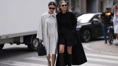 Annabel Rosendahl and Tine Andrea Lauvli walking outside at Copenhagen fashion week