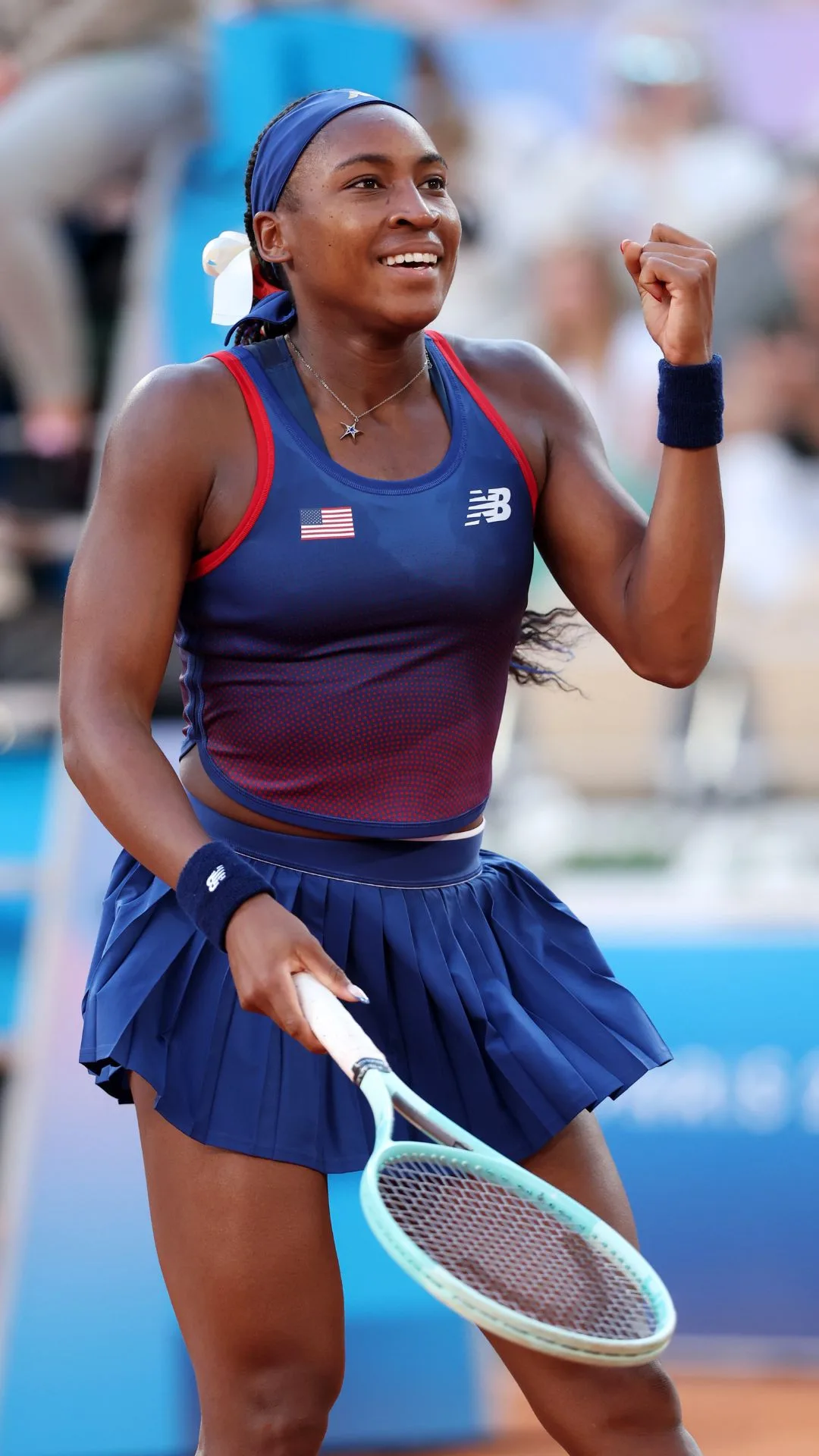 Coco Gauff of Team USA celebrates winning match point against Australia's Ajla Tomljanovic in the Women’s Singles first round match on day two of the Olympic Games Paris 2024.