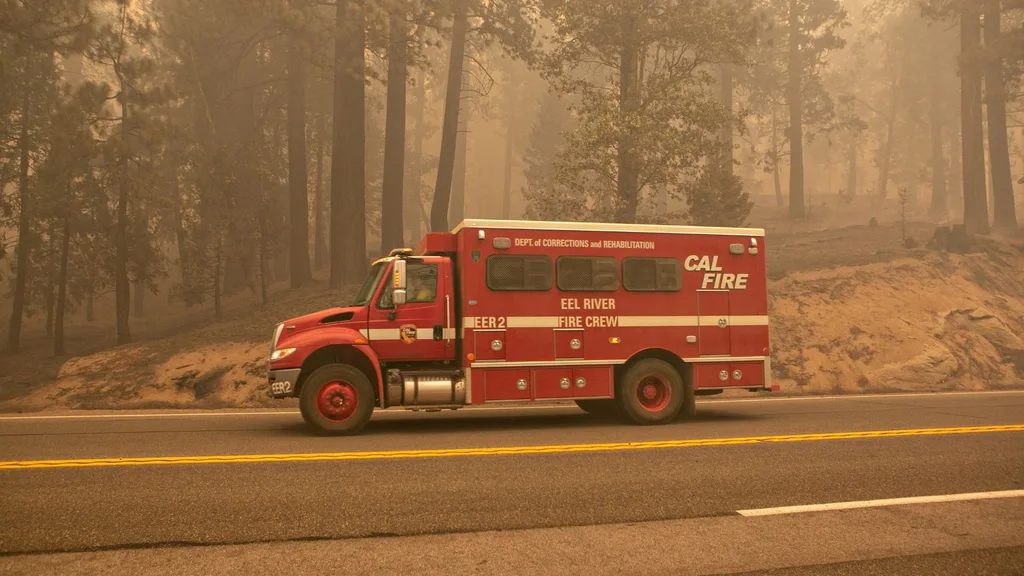 Incarcerated firefighters from Eel River Conservation Camp tackle the Caldor Fire at Lake Tahoe Basin in Strawberry, CA, 2021.