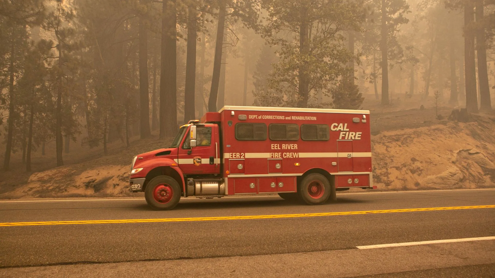 Incarcerated firefighters from Eel River Conservation Camp tackle the Caldor Fire at Lake Tahoe Basin in Strawberry, CA, 2021. 