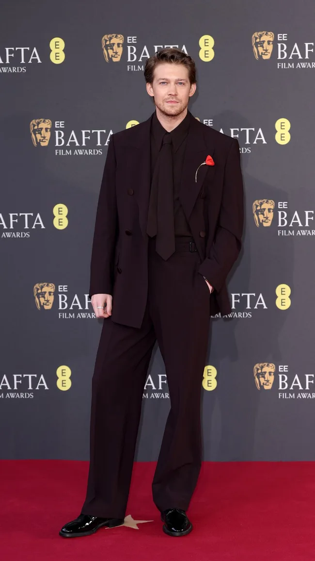 Joe Alwyn on the 2025 BAFTAs red carpet