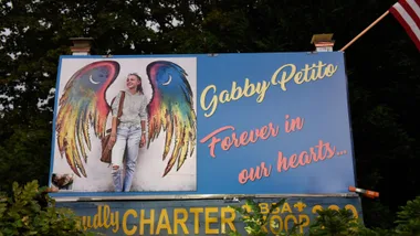 A sign honors the death of Gabby Petito on September 24, 2021 in Blue Point, New York. Gabby Petito's hometown of Blue Point put out candles along main streets and in driveways to honor the teenager who has riveted the nation since the details of her death became known.