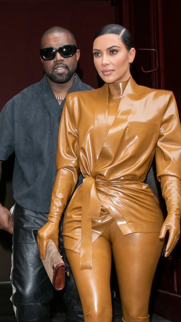 A papparazzi phtoo of Kanye West and wife Kim Kardashian