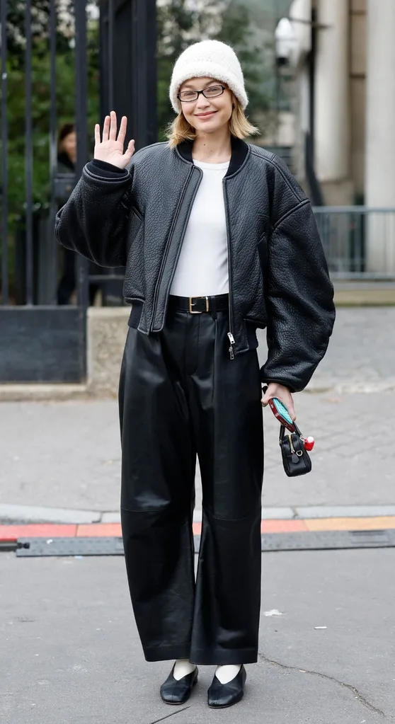Gigi Hadid wearing a black and white outfit