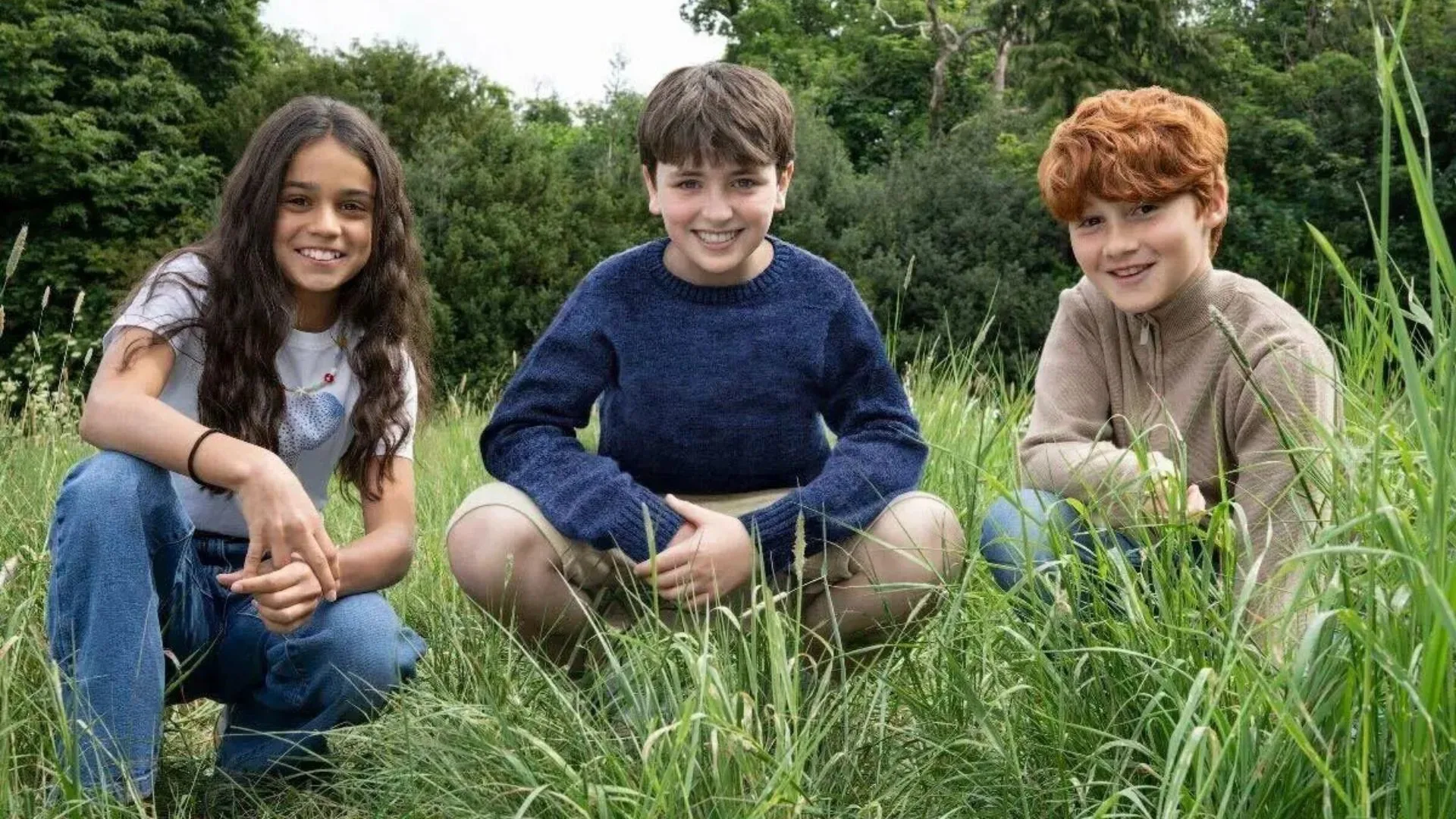 Three smiling children including actress Arabella Stanton who's set to play Hermione in the new Harry Potter series. 