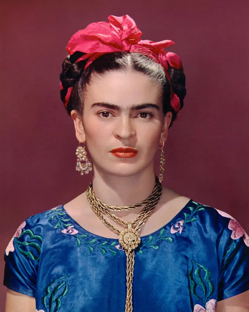 Frida Kahlo in blue satin blouse, 1939, photograph by Nickolas Muray Nickolas Muray Photo Archives