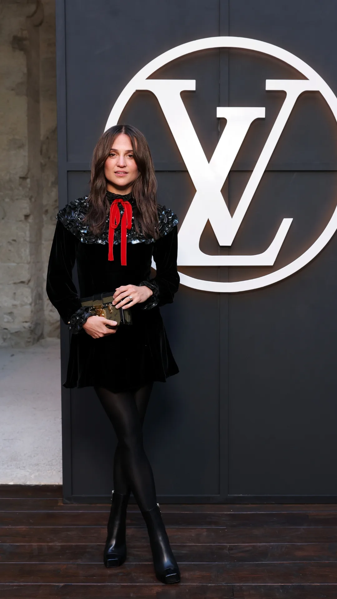 Alicia Vikander attends the LV Cruise Fashion Show at Cité des Papes
