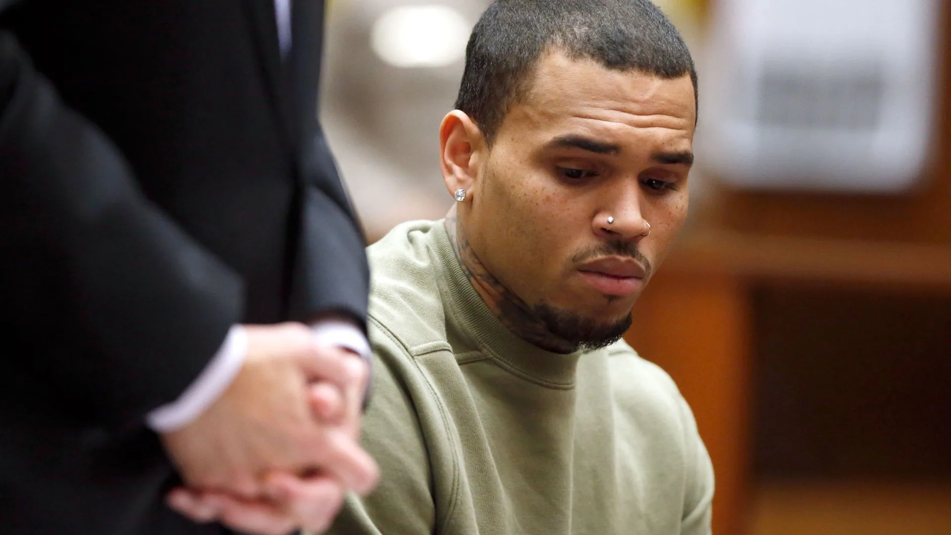 Chris Brown appears in court facing charges of assault against his then-girlfriend Rihanna. 
