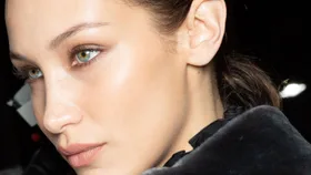 model wearing black mascara