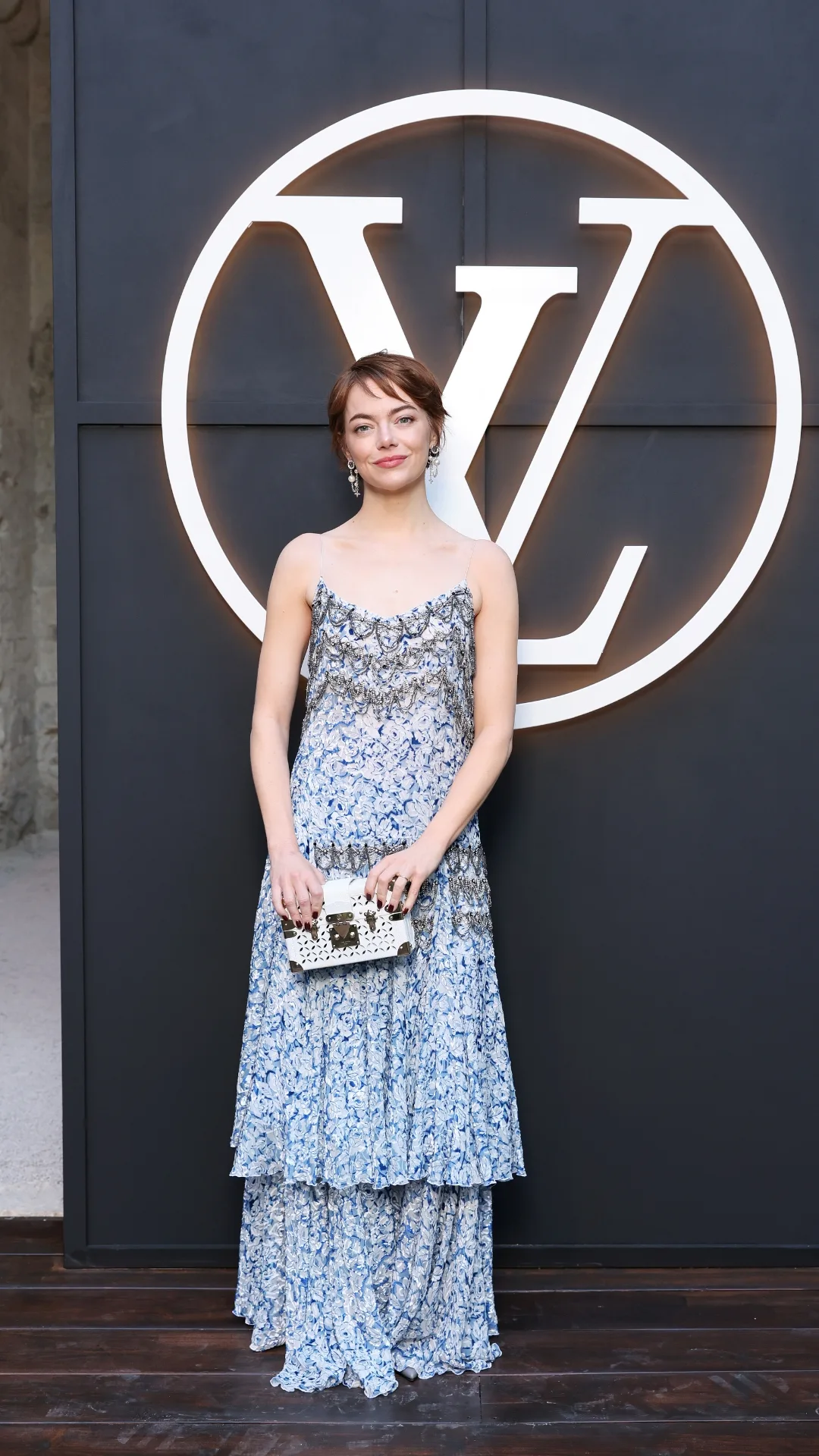 Emma Stone attends the LV Cruise Fashion Show at Cité des Papes