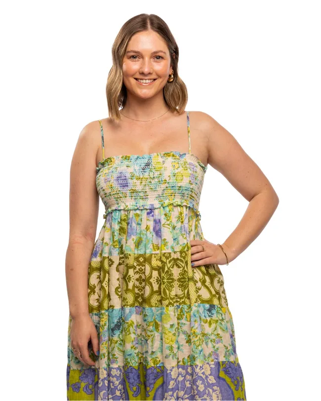 Annie from Farmer Wants A Wife: A smiling woman standing with her hand on her hip.