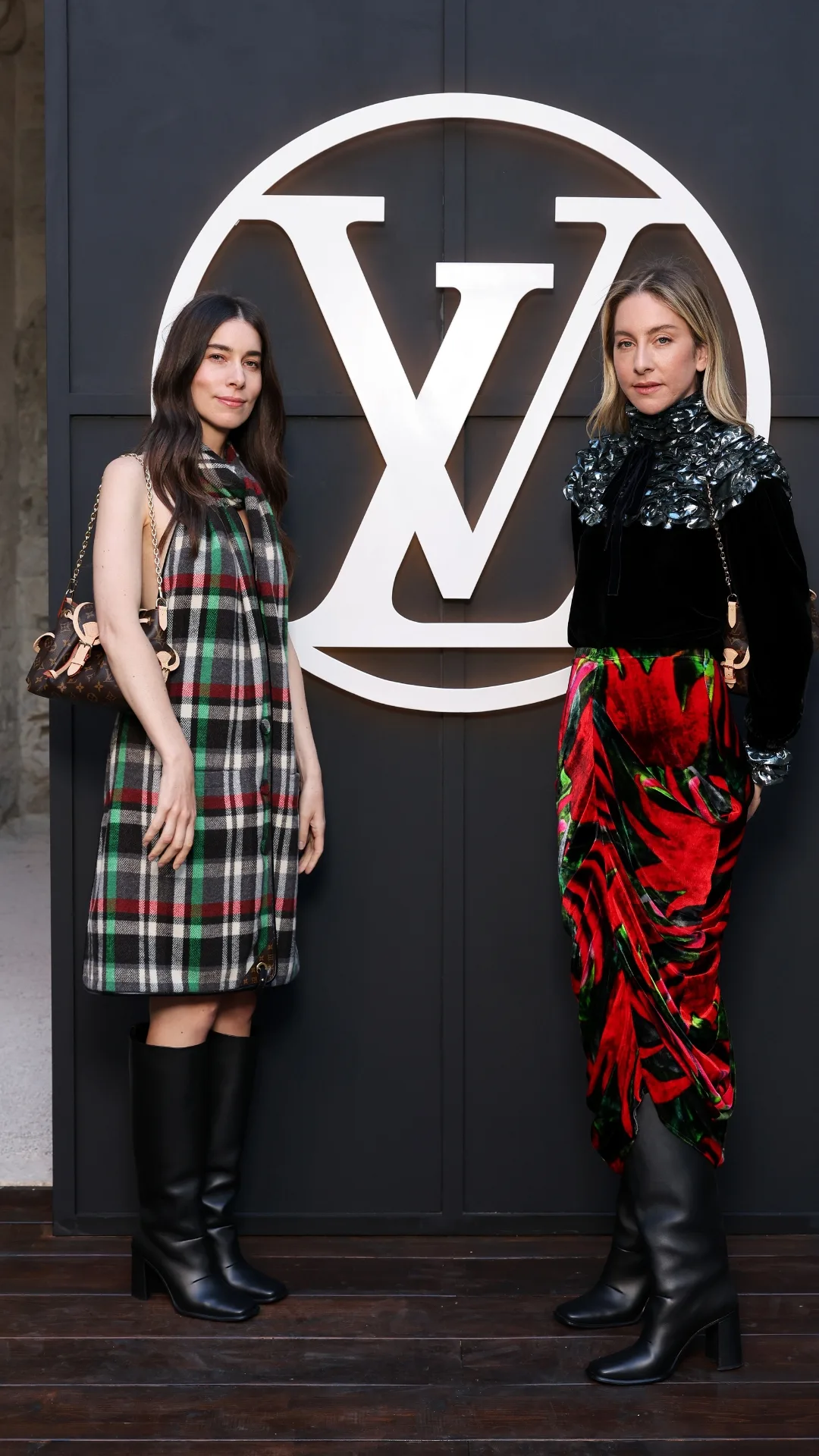 Danielle Haim and Este Haim attend the LV Cruise Fashion Show at Cité des Papes
