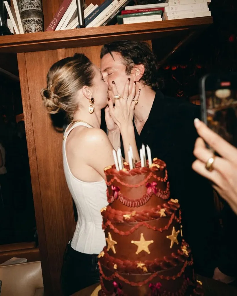 Gigi Hadid and Bradley Cooper celebrate her 30th birthday with a sweet kiss posted on social media.