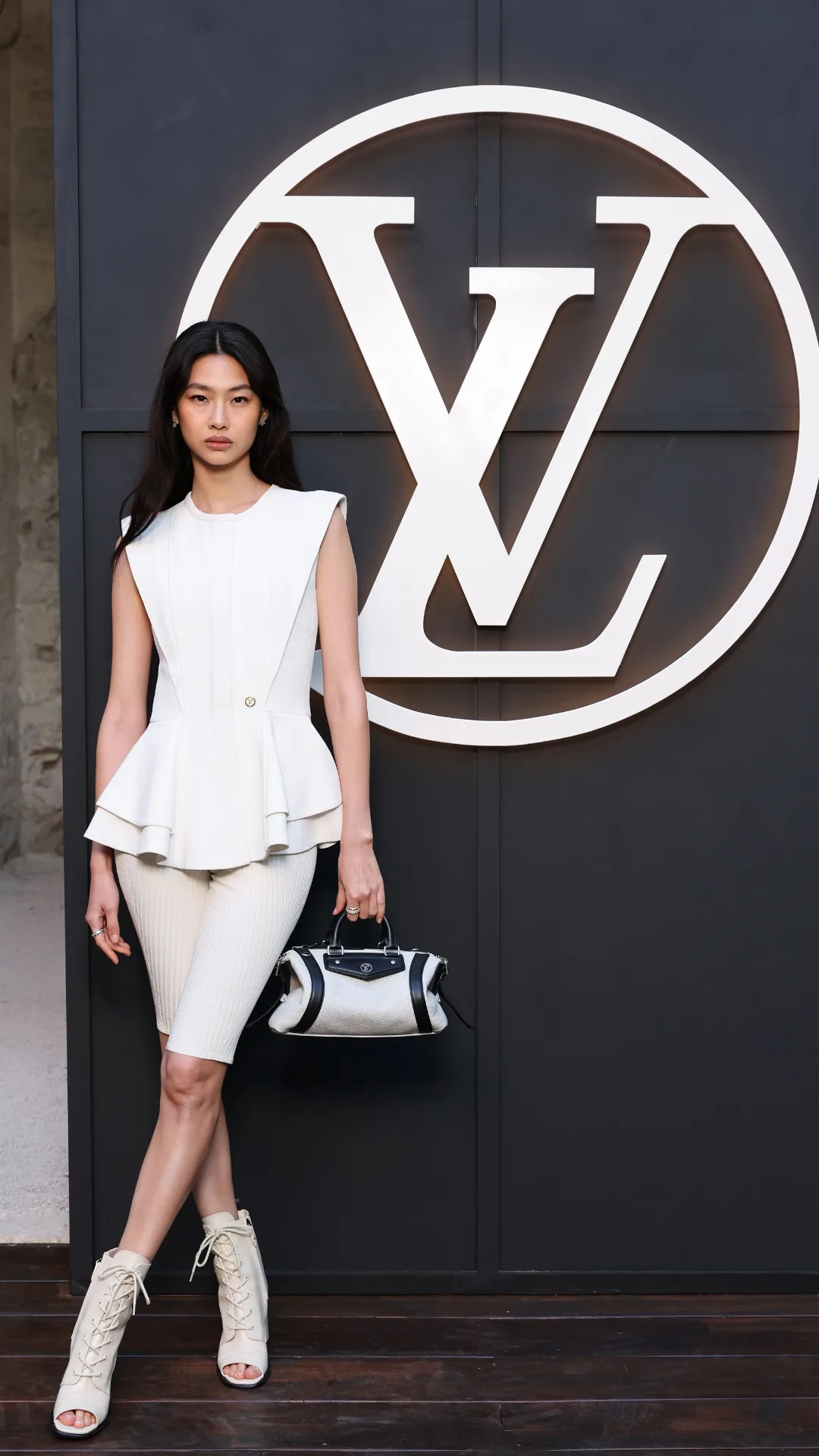 Hoyeon attends the LV Cruise Fashion Show at Cité des Papes
