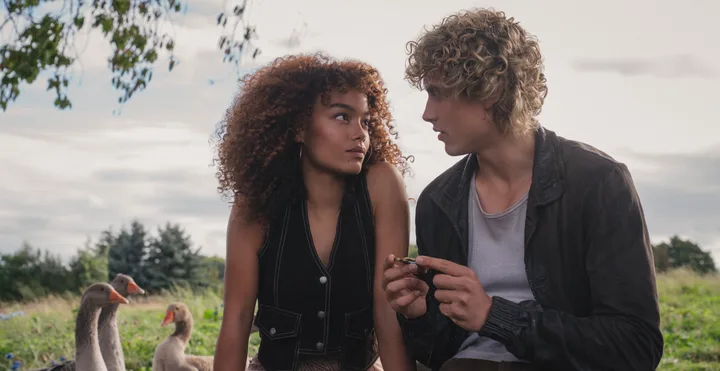 Whitney Peak as Lenore Dove Baird and Joseph Zada as Haymitch Abernathy in The Hunger Games: Sunrise on the Reaping. Photo Credit: Murray Close