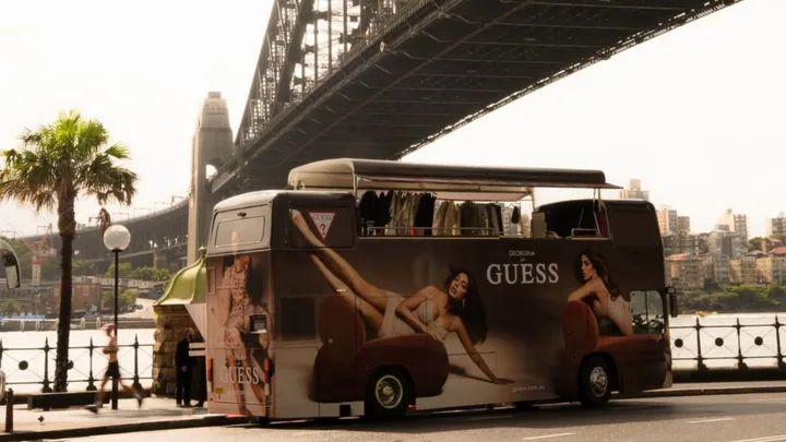 GUESS Rolled Out The Glam In Sydney With A Double-Decker Fashion Bus