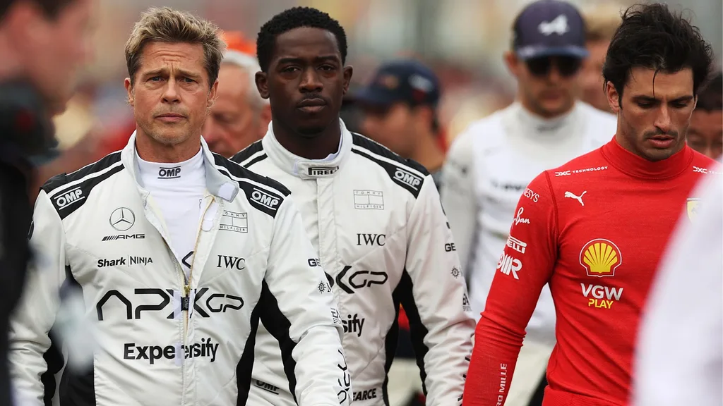 f1 movie brad pitt damson idris and carlos seinz walk together