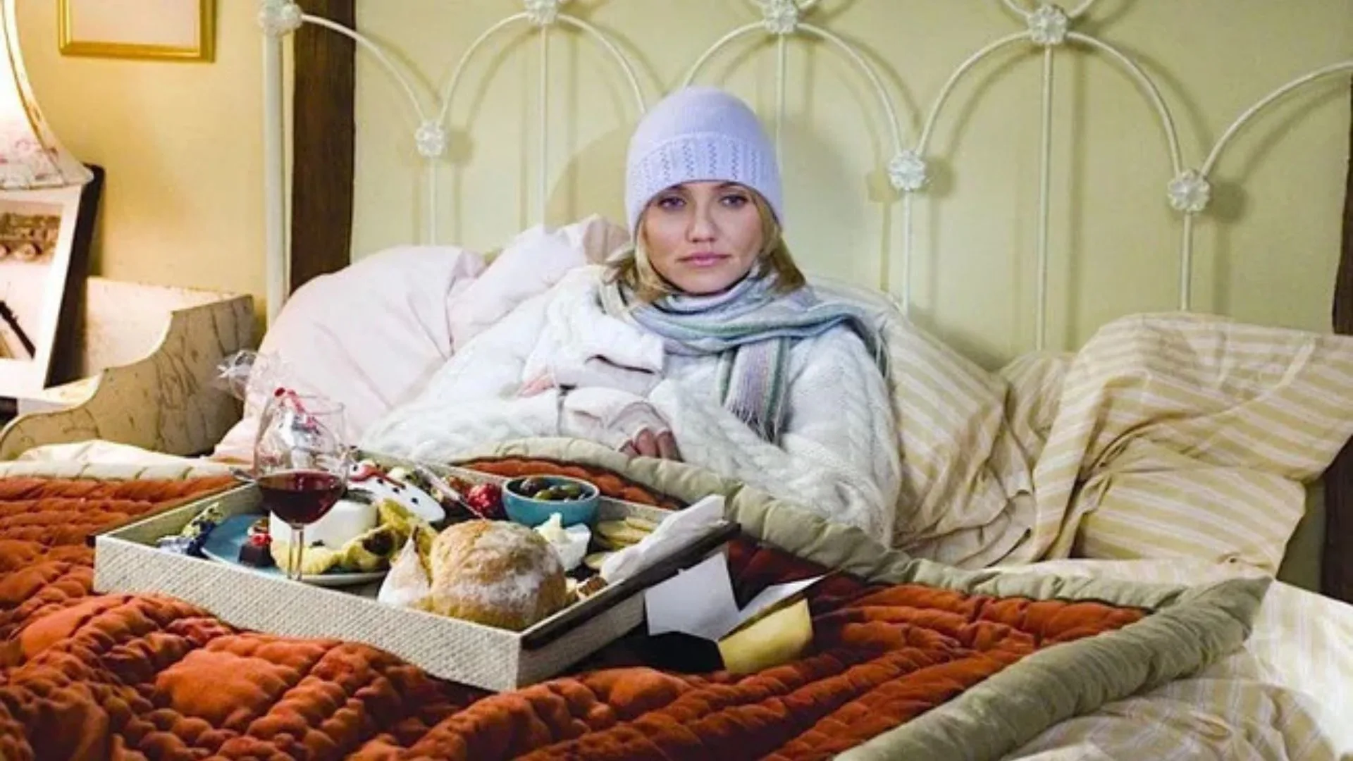 cameron diaz in bed in The Holiday wearing a beanie