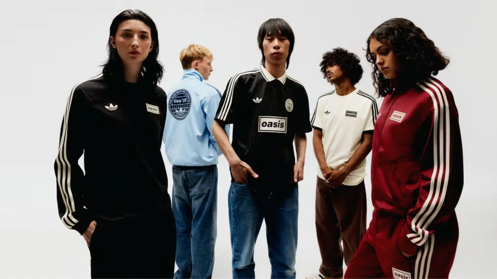 A group of young men and women modelling Oasis x Adidas tour merch.